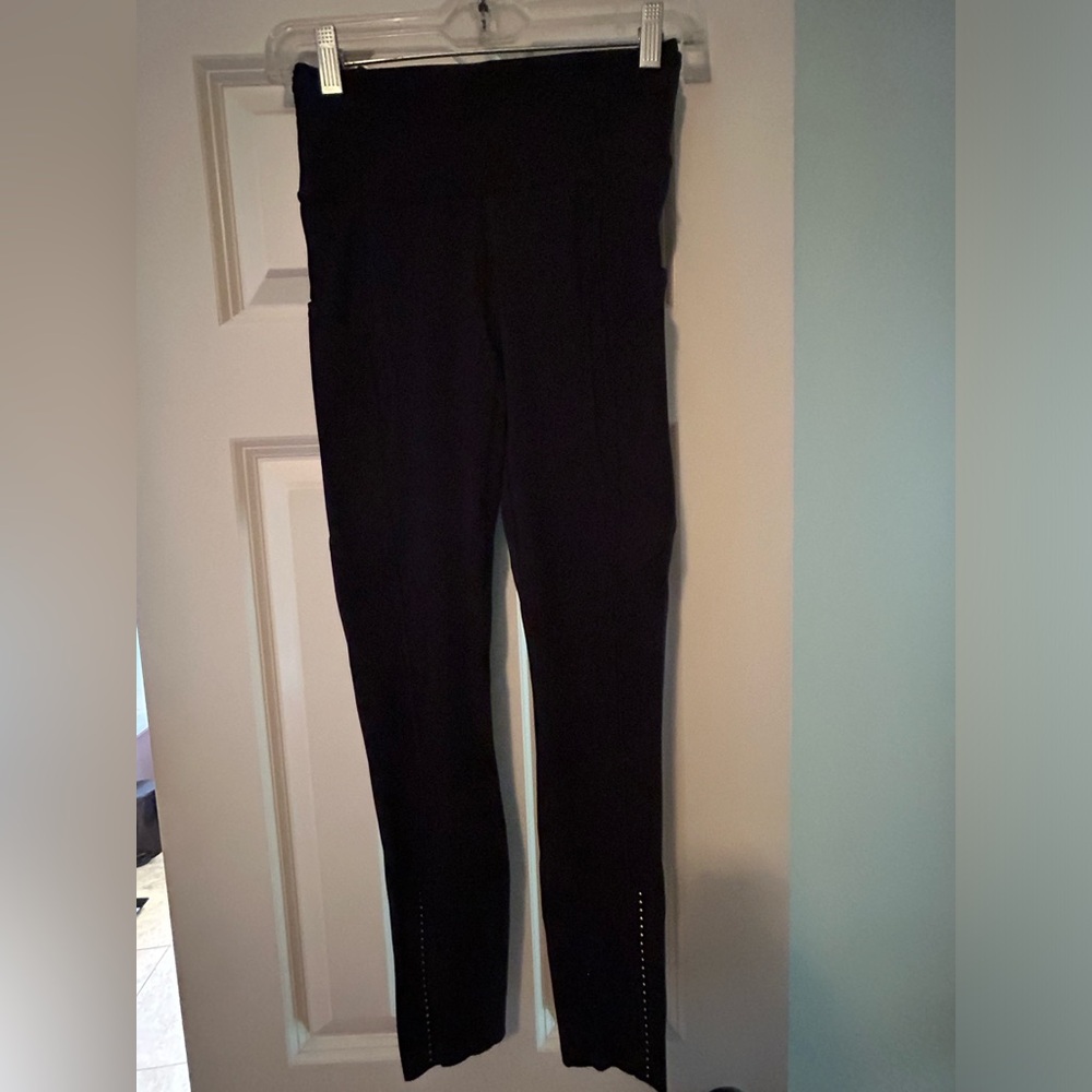 Lululemon black 25” Fast and Free leggings, size 4